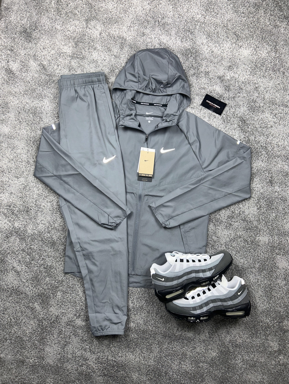 GRIJS TRAININGSPAK NIKE REPEL CHALLENGER