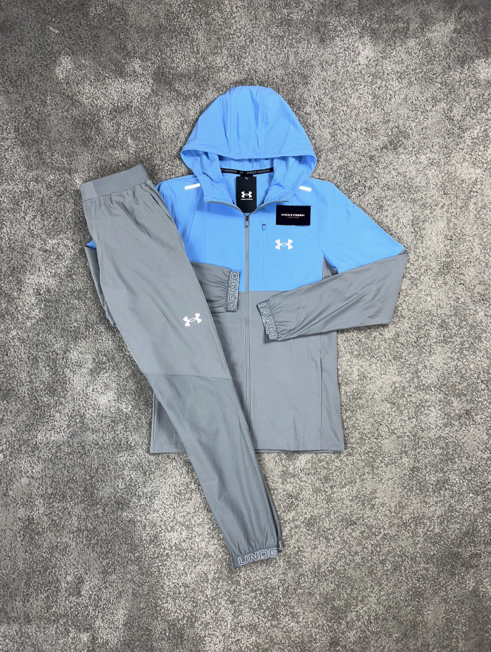 TRAININGSPAK UNDER ARMOUR "VANISH BABYBLAUW"