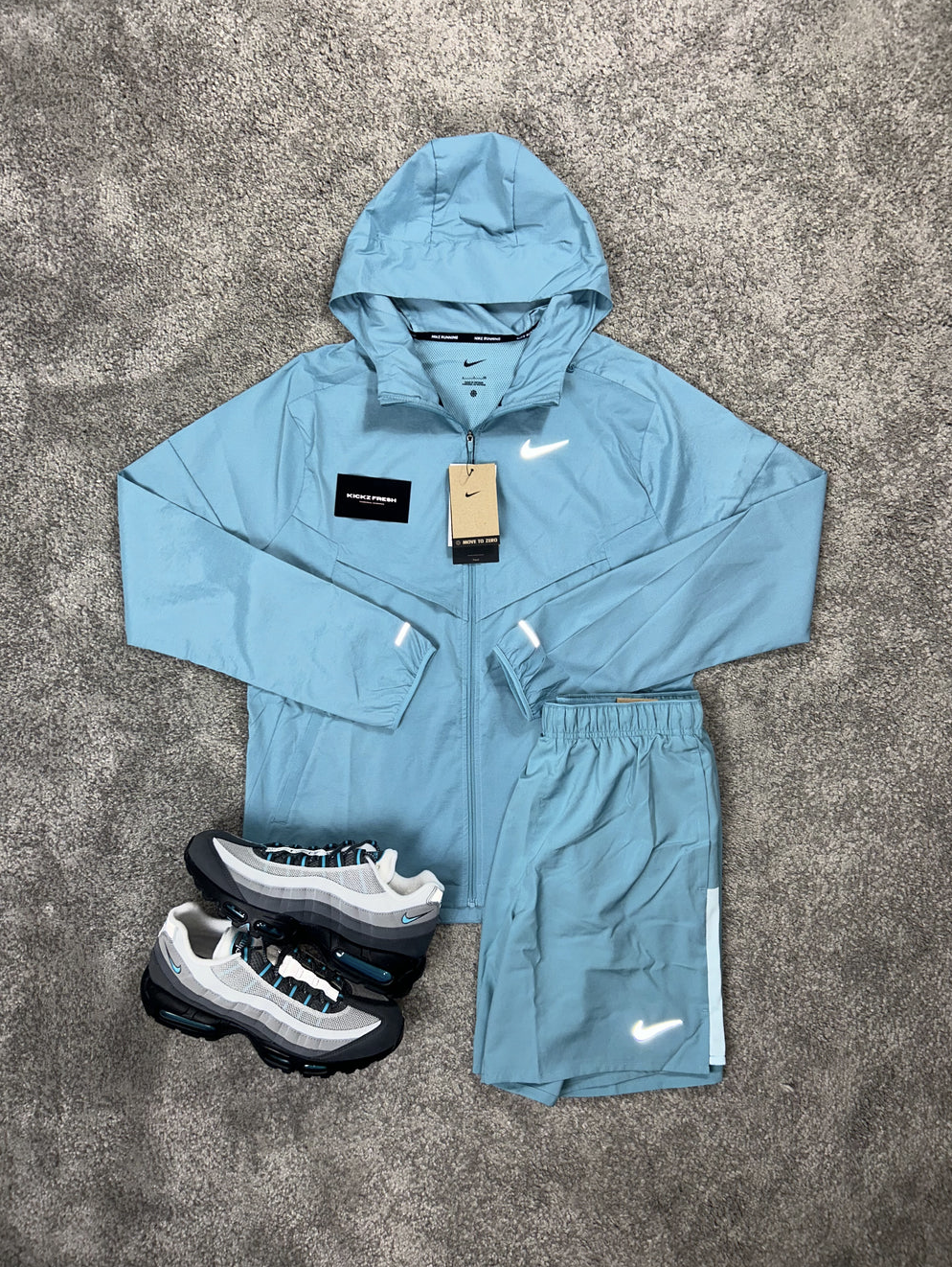 NIKE WINDRUNNER-SET IN ZEEBLAUW VOOR HEREN