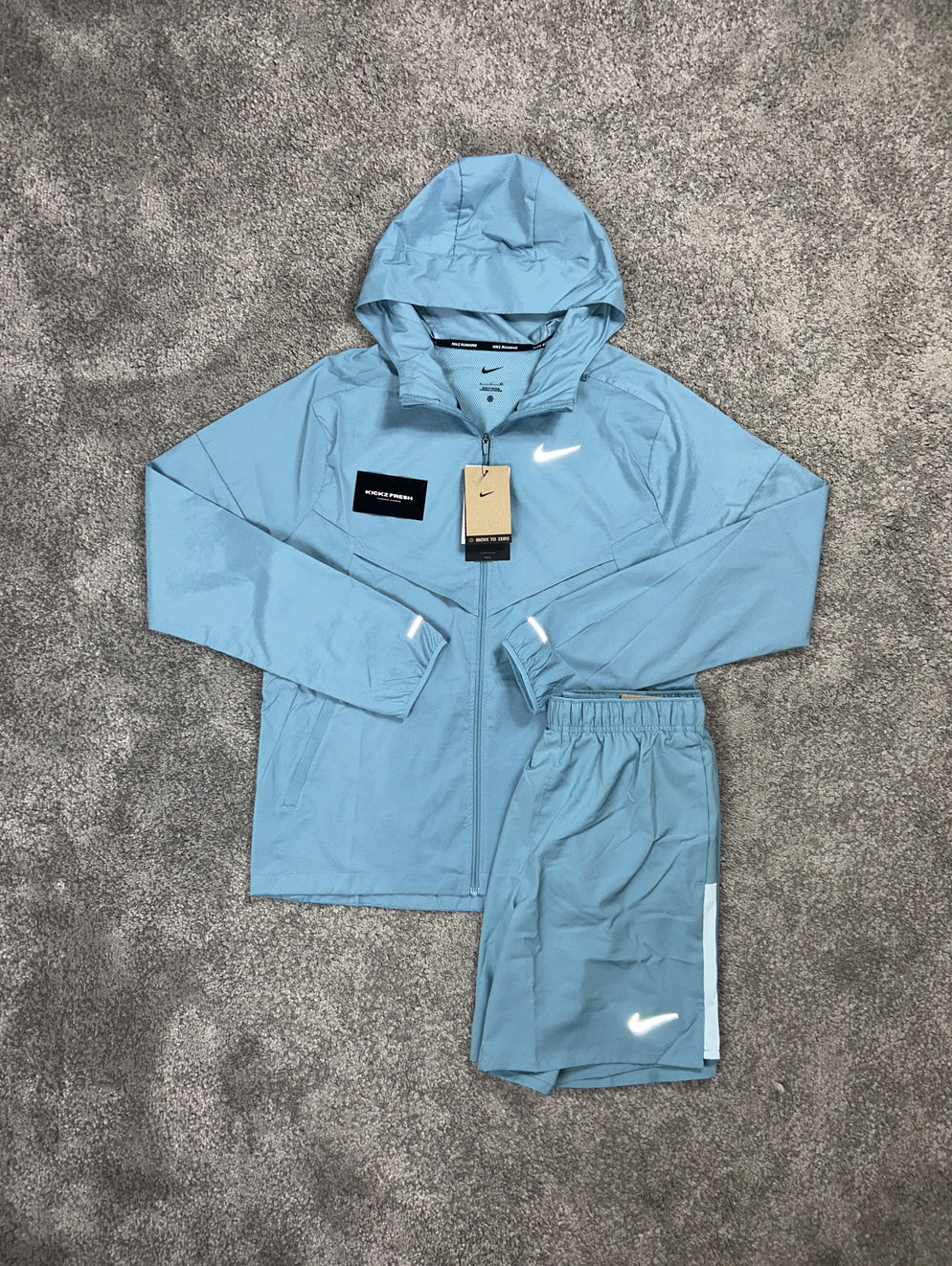 NIKE WINDRUNNER-SET IN ZEEBLAUW VOOR HEREN