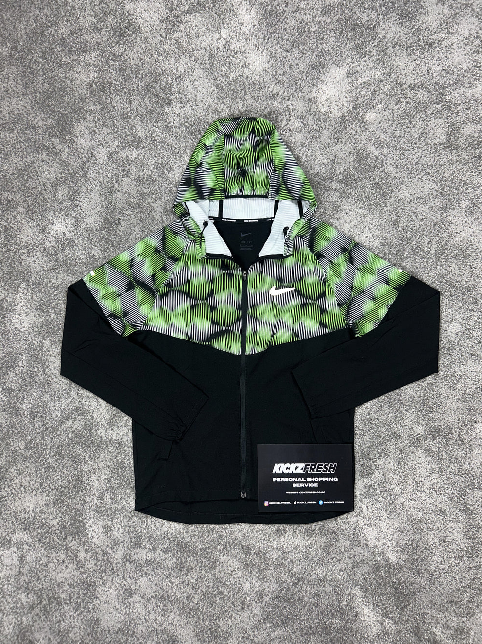 NIKE WINDRUNNER-JAS SOUNDWAVE IN STOOMGROEN