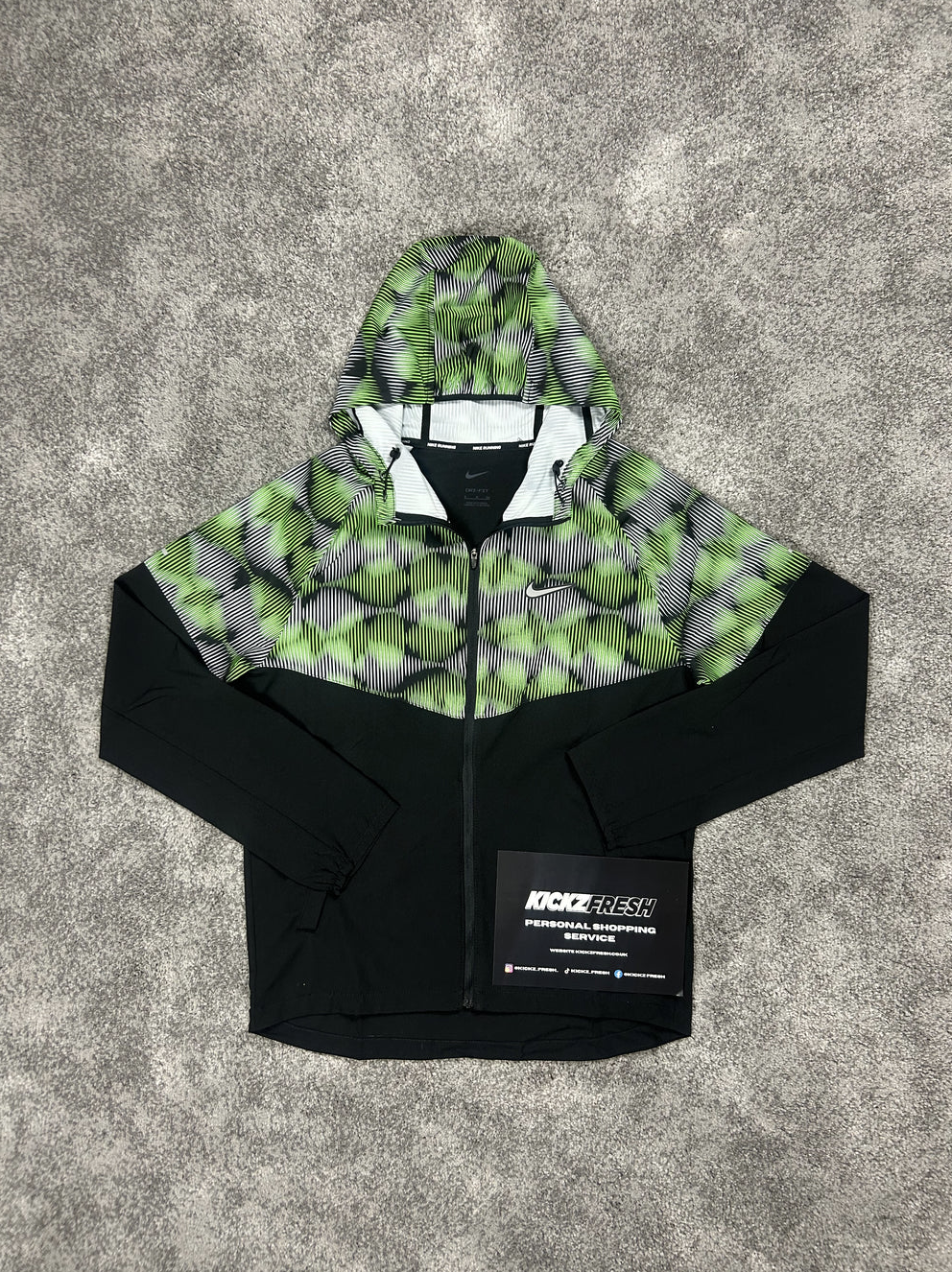 NIKE WINDRUNNER-JAS SOUNDWAVE IN STOOMGROEN
