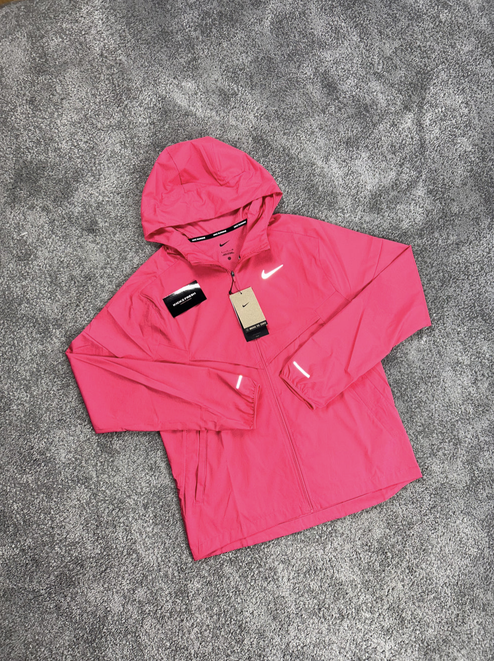 NIKE WINDRUNNER-JAS IN ADOBE ROSE