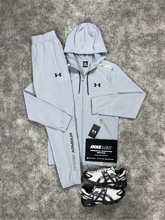 LICHTGRIJS GEWEVEN TRAININGSPAK UNDER ARMOUR