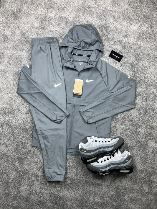 GRIJS TRAININGSPAK NIKE REPEL CHALLENGER