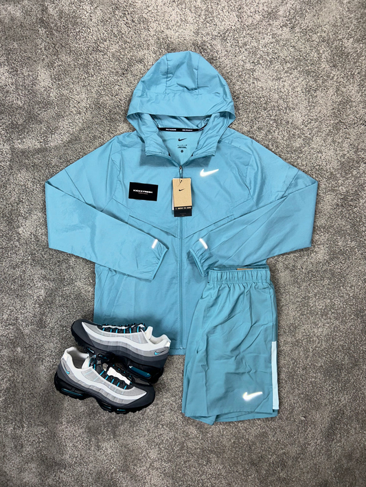 NIKE WINDRUNNER-SET IN ZEEBLAUW VOOR HEREN